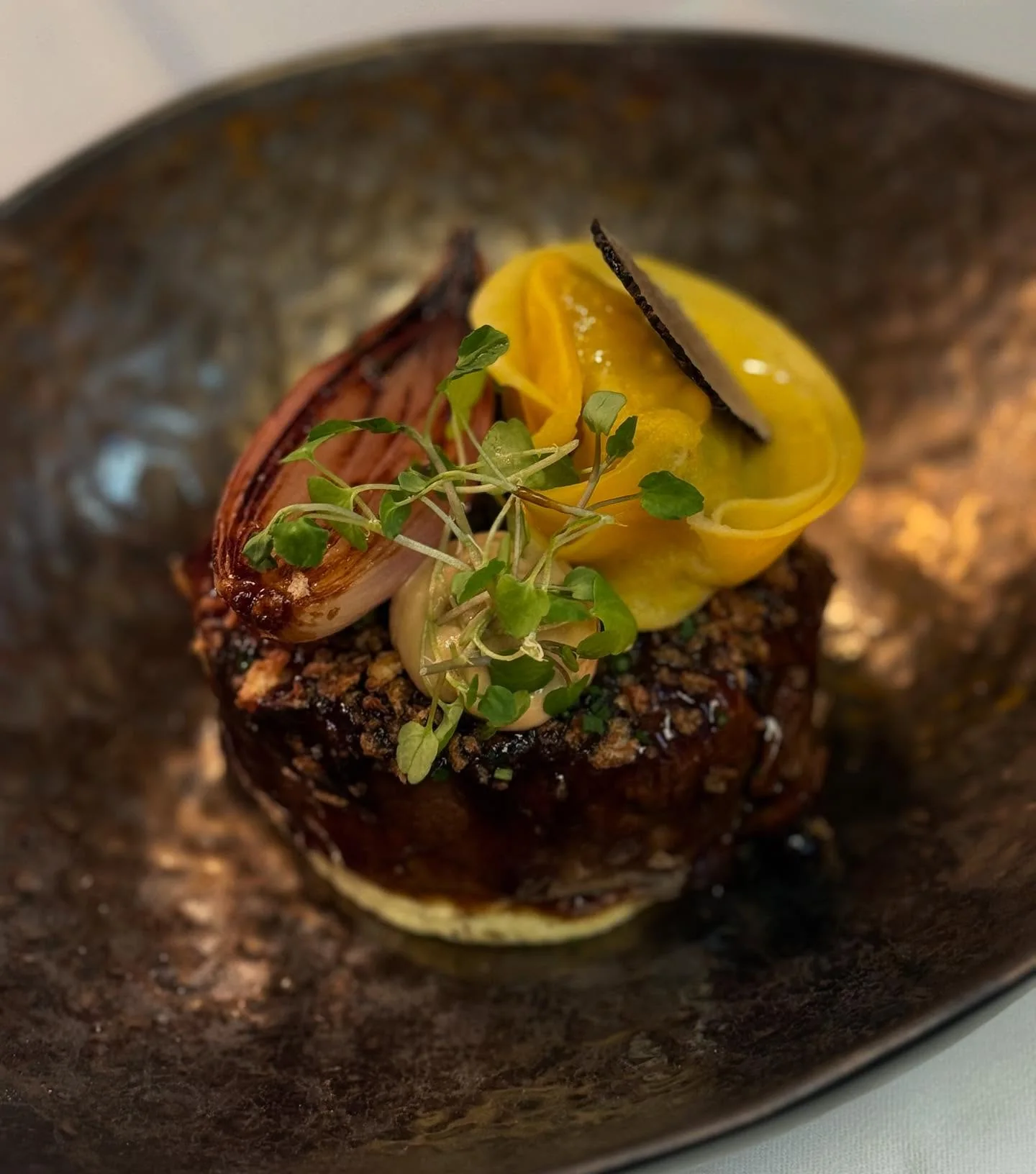 A plated dish with seasonal produce